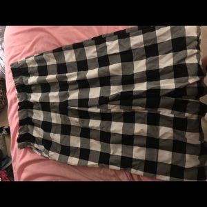 Checked pants with cinched waist and flare leg